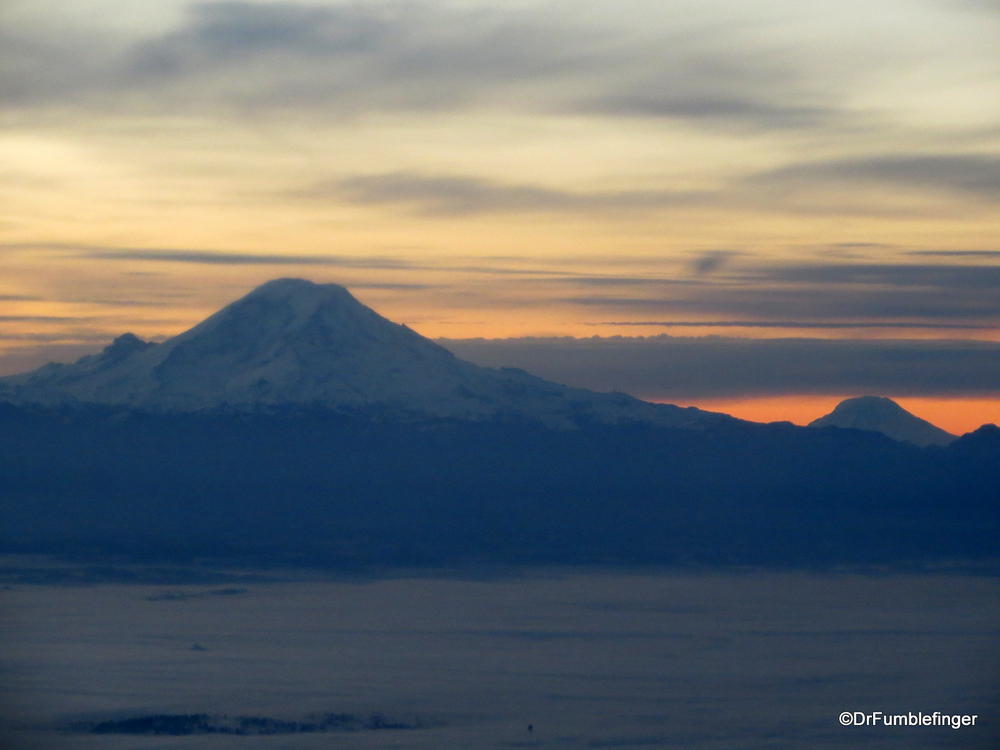 Sunrise over Mt. Rainier(L) and Mt. St. Helens (R background).  Washington state