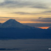 Sunrise over Mt. Rainier(L) and Mt. St. Helens (R background).  Washington state