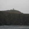 Cape Horn, the most southerly point of South America.  A memorial (with an albatross is present on its hill.