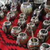 Beautiful collection of mate cups at the Puerto de Frutos market, El Tigre Argentina.  Mate is the national drink of Argentina, a type of tea