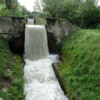 Water flowing into Canal des Alpilles near Saint-Remy