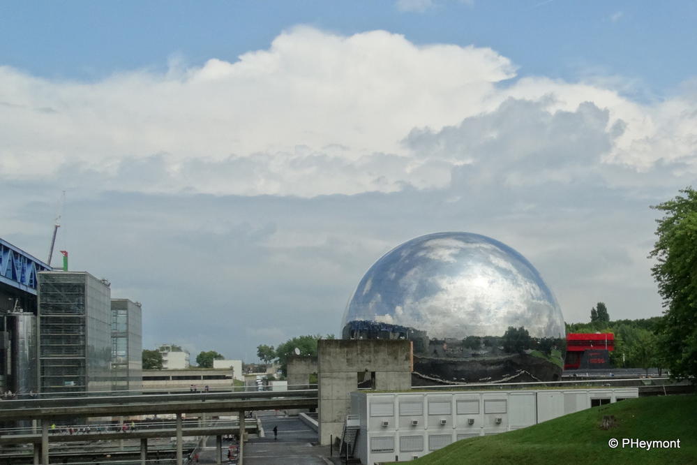 Geode reflects its surroundings at the Cite des Sciences et Industrie, Paris. The dome houses an iMax theatre and planetarium