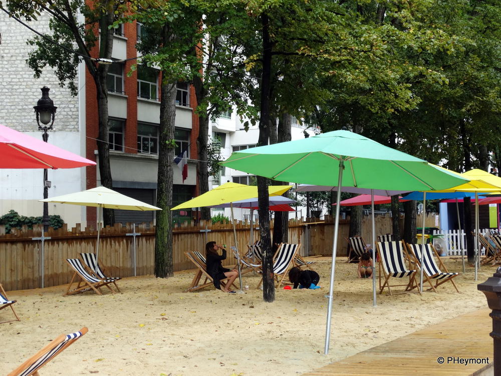 One of Paris' informal summer beaches, this one along the Bassin de la Villette