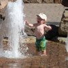 Child delighted with pool, Vail, Colorado