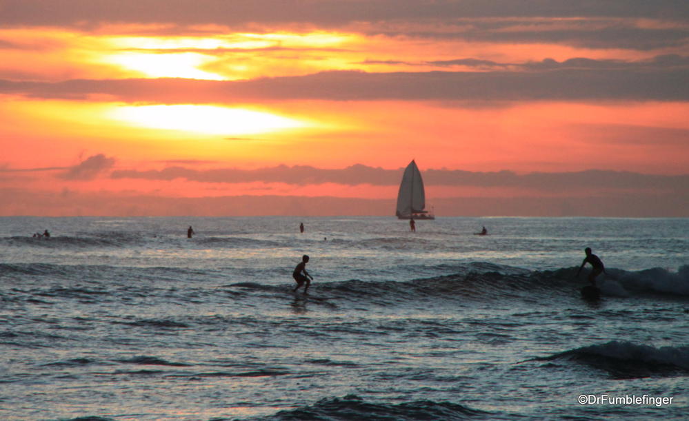 Surfing at sunset, Waikiki beach
