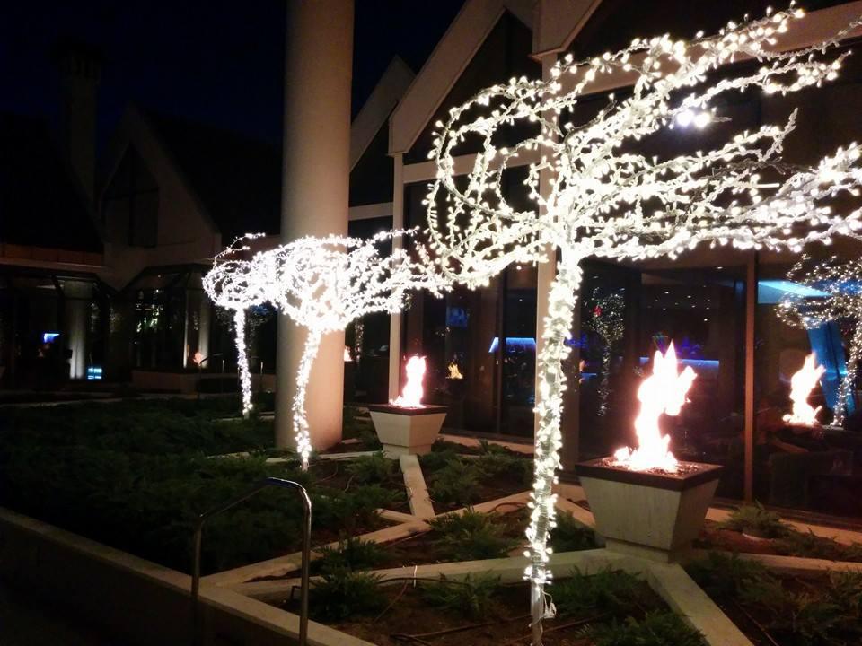Christmas lit trees and torches at the Coeur d'Alene Resort