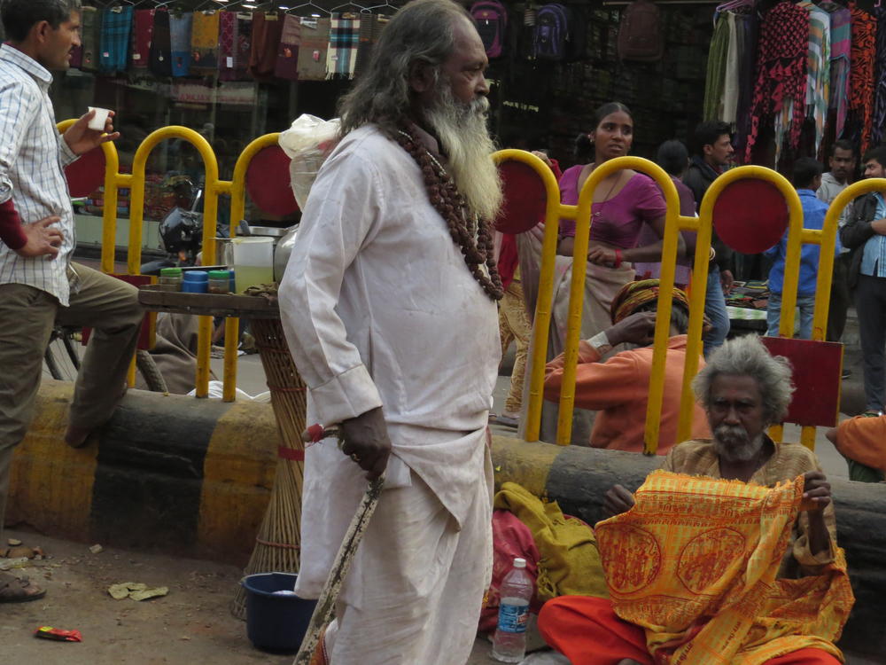 Holy man, walking the streets of Varanasi
