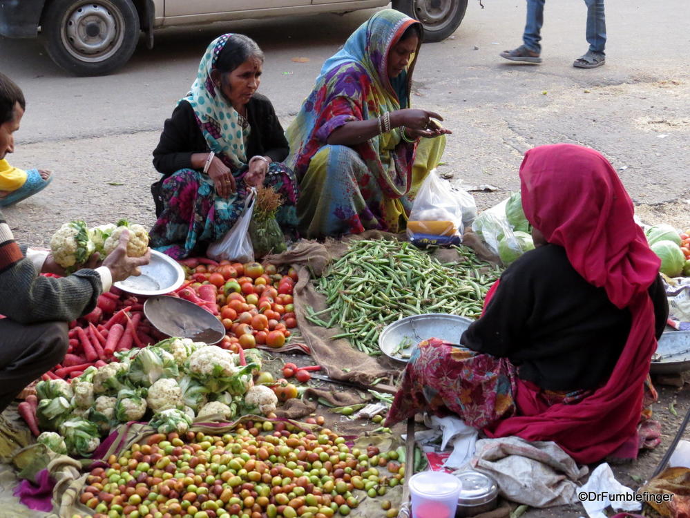 Streetside produce vendors and shoppers, Jaipur