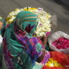 Selling flowers for offerings in front of a Hindu temple