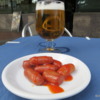 Beer and tapas -- these small weiner-like sausages in a great sauce (almost like a German currywurst).  Madrid