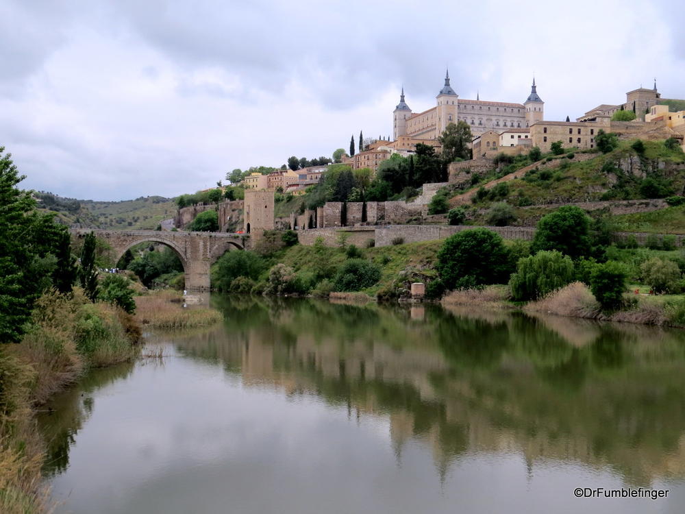 Tajo River with Old Bridge and view of Toledo sitting atop its hill