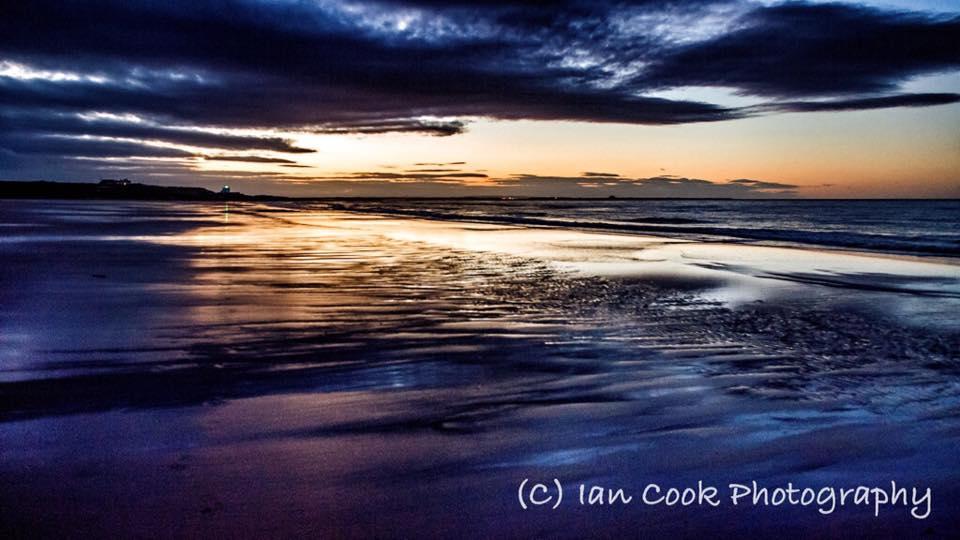 Sunset Bamburgh Beach Northumberland.