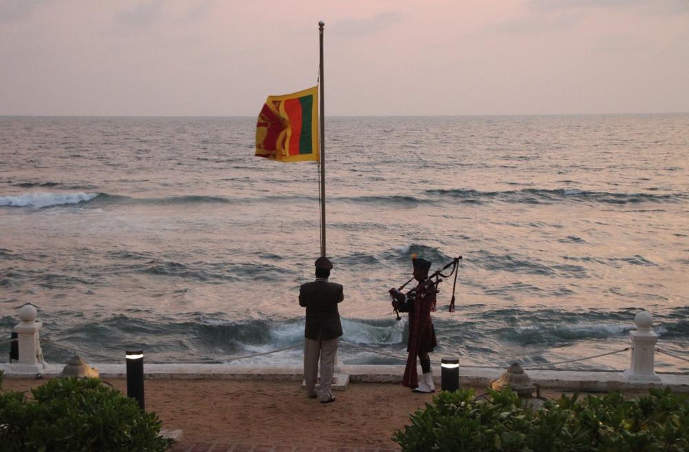 Lowering of the flag at sunset, Galle Face Hotel, Colombo