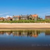A rather tropical day at Alnmouth Northumberland! The houses reflected in the river Aln at low tide.