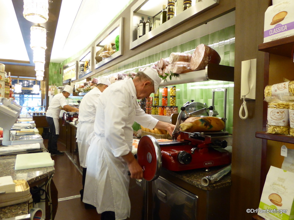 Butcher shop, slicing Parma ham, in Milan