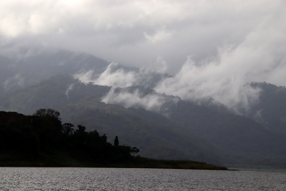Low hanging clouds and drizzle over Lake Arenal, Costa Rica