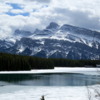 Mt. Rundle framing a half melted Two Jack Lake, Banff National Park