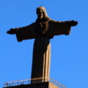 Tall Cristo Rei statue across the river from Lisbon